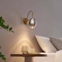 Applique dorée LED en arc avec globe ovale suspendu - Nuvéo