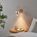 Applique dorée LED en arc avec globe ovale suspendu - Nuvéo