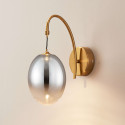 Applique dorée LED en arc avec globe ovale suspendu - Nuvéo